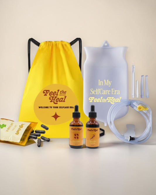 Self-care products including bottles, a yellow drawstring bag, and a white device on a beige background.