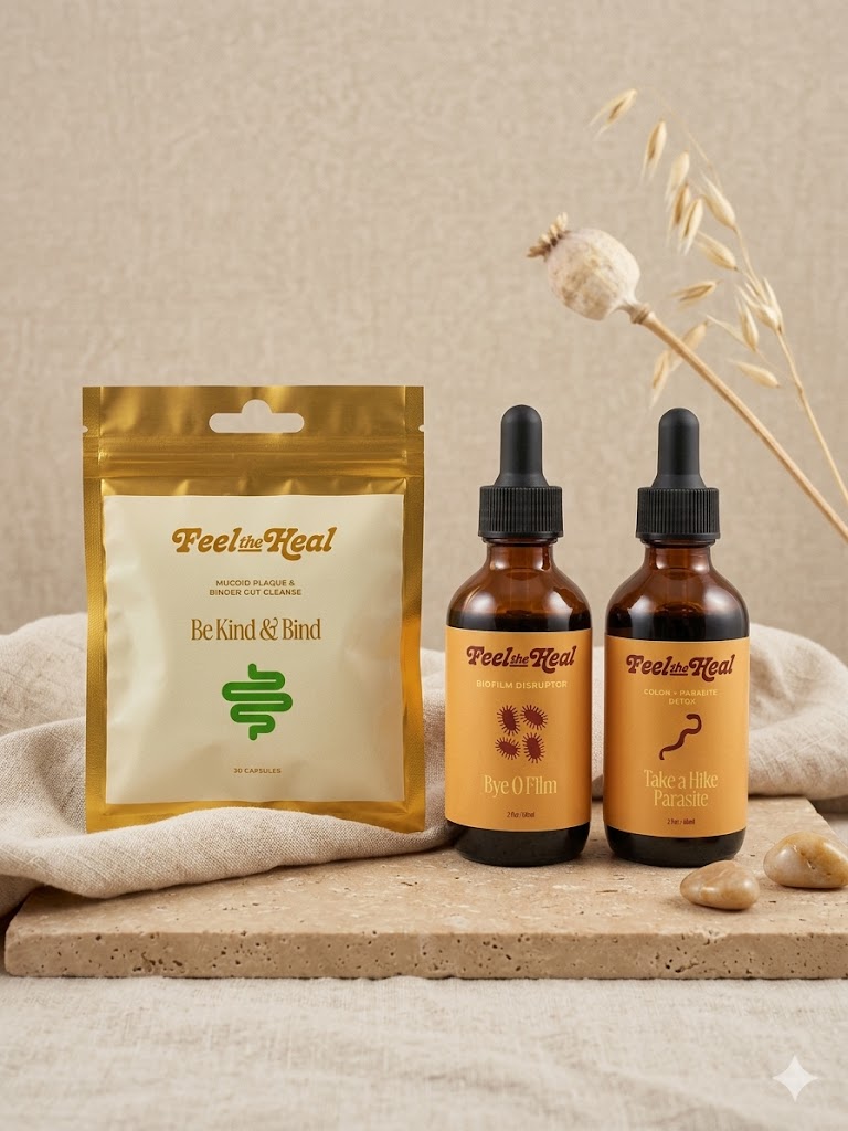 Two bottles and a package of 'Feel Heal' products on a neutral background