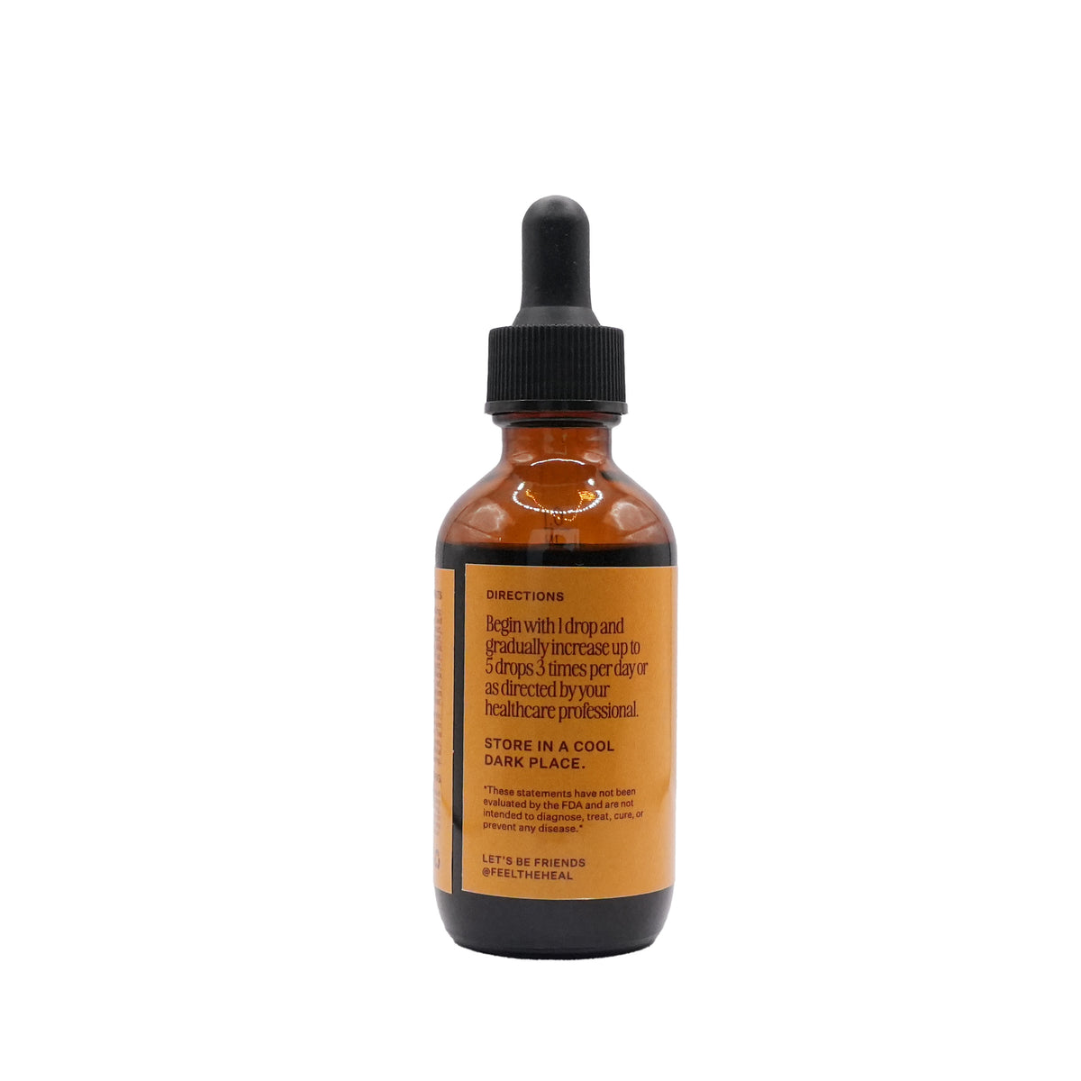 Brown glass bottle with dropper on a white background