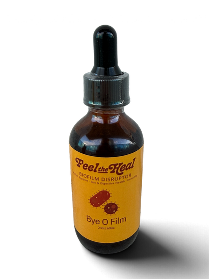An amber glass dropper bottle with a black cap and a yellow label reading 'Feel the Heal' and 'Bye O Film', photographed on a white background with a soft shadow.