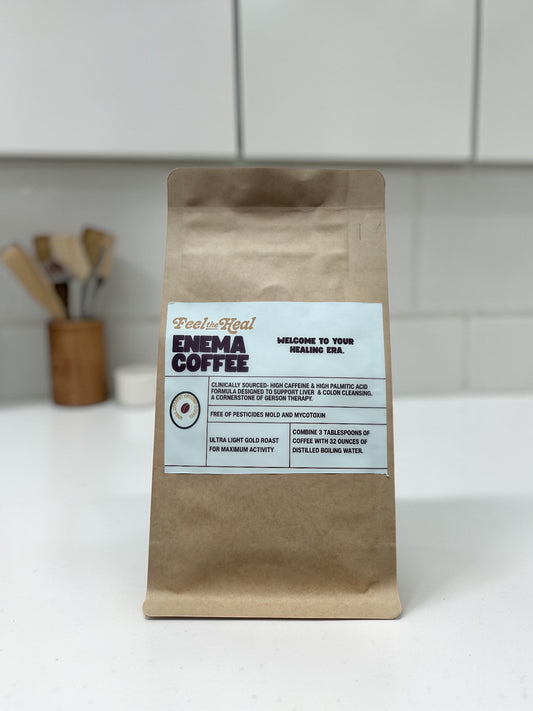 feel the heal paper coffee bag with a label on a white surface